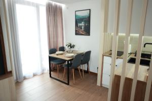 Ліжко або ліжка в номері Apartman Borovi 11 Divčibare
