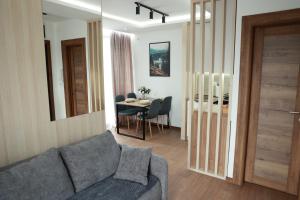 Зона вітальні в Apartman Borovi 11 Divčibare