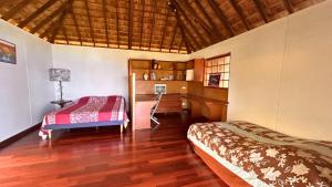 Ένα ή περισσότερα κρεβάτια σε δωμάτιο στο TAHITI - Villa Zen +26 φωτογραφίες