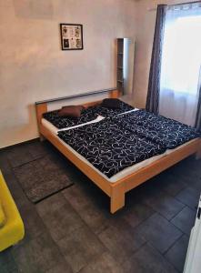 Postel nebo postele na pokoji v ubytování Apartmán KK