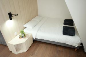 Ліжко або ліжка в номері Apartman Borovi 11 Divčibare