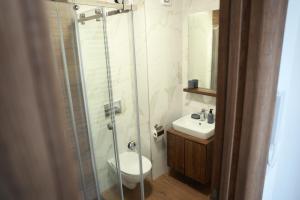 Ванна кімната в Apartman Borovi 11 Divčibare