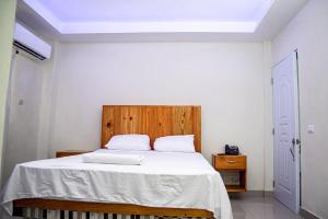 Postel nebo postele na pokoji v ubytování Hotel J&M