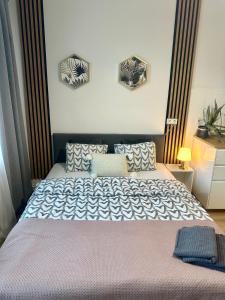 Posteľ alebo postele v izbe v ubytovaní Exclusive Apartments Smolna