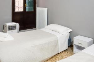 Posteľ alebo postele v izbe v ubytovaní Apartment Odesos + 14 fotografií