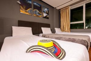 Voodi või voodid majutusasutuse HOTEL HTL toas