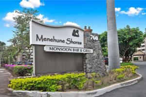 a sign for a marriottume shops moronsons bay club at Menehune Shores 606 in Kihei