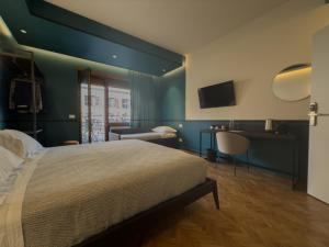 Postel nebo postele na pokoji v ubytování Vatican Domus Stefania Guest House