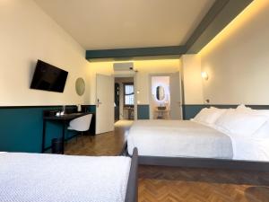 Postel nebo postele na pokoji v ubytování Vatican Domus Stefania Guest House + 25 fotografií