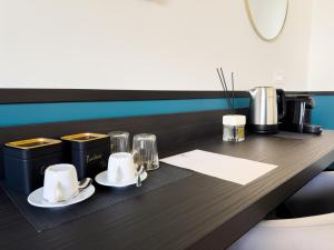 Příslušenství pro přípravu čaje a kávy v ubytování Vatican Domus Stefania Guest House