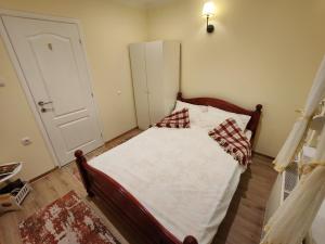 Postel nebo postele na pokoji v ubytování Ravana Sky Apartments
