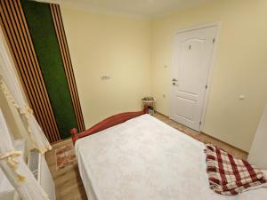 Postel nebo postele na pokoji v ubytování Ravana Sky Apartments