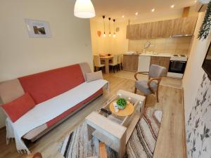 Posezení v ubytování Ravana Sky Apartments