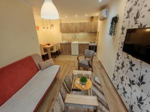 Posezení v ubytování Ravana Sky Apartments