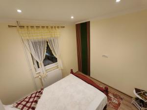 Postel nebo postele na pokoji v ubytování Ravana Sky Apartments