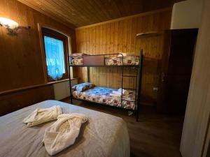 Postel nebo postele na pokoji v ubytování Casa Experience - Venas Di Cadore