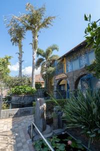 a house with a statue in front of it at Rebeca's Family Travel Getaway! Golan! Hand-Made in Qasrîne