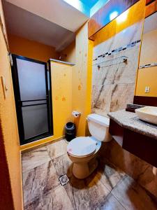 Koupelna v ubytování Hotel Rodelu