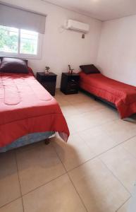 Postel nebo postele na pokoji v ubytování La Casita de DaniMar