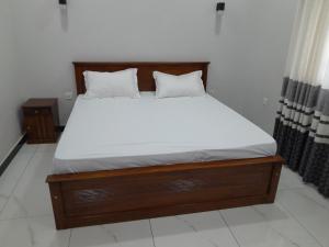 Postel nebo postele na pokoji v ubytování Alps Villa