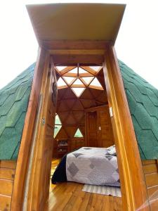 Postel nebo postele na pokoji v ubytování Glamping domo el colibrí