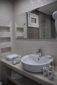 Ванная комната в WhiteSands Beach Resort
