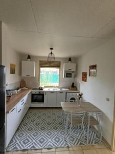Kuchyň nebo kuchyňský kout v ubytování Villa dix blue