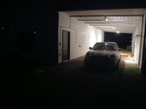 a car parked in a garage at night at Peaceful Place in Covington