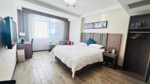 Voodi või voodid majutusasutuse Bestway Hotel Xi'an toas
