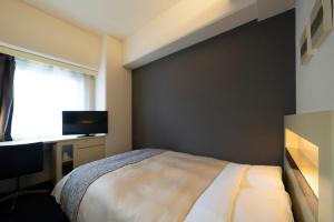 Sjónvarps- og/eða afþreyingartæki á Hotel Binario Umeda