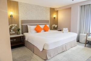 Letto o letti in una camera di Hotel St. Ellis