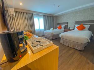 Letto o letti in una camera di Hotel St. Ellis