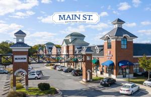 a view of a mall with cars parked in a parking lot at Londontowne Hideaway in Annapolis