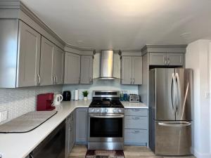 Η κουζίνα ή μικρή κουζίνα στο Luxury Modern Apt near NYC for 4 people