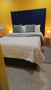 Кровать или кровати в номере Ladorkita Cozy