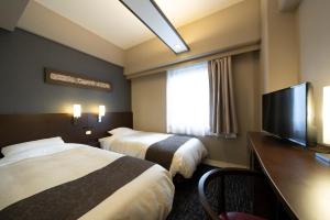 Sjónvarps- og/eða afþreyingartæki á Hotel Binario Umeda