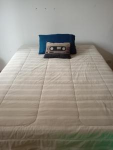 Cama ou camas em um quarto em Quarto Privativo a 10 Min do Aeroporto GRU I
