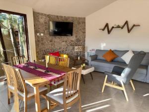 Televisyen dan/atau pusat hiburan di Loft Kaela en, Val'Quirico