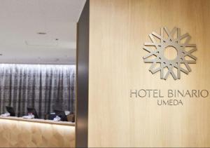 Vottorð, verðlaun, skilti eða annað skjal til sýnis á Hotel Binario Umeda