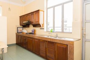 Kuchyň nebo kuchyňský kout v ubytování Asian Rooms Colombo 14