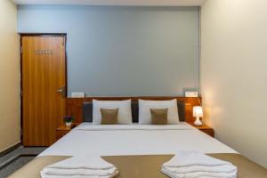 Hotel Chalet, Madiwala客房内的一张或多张床位