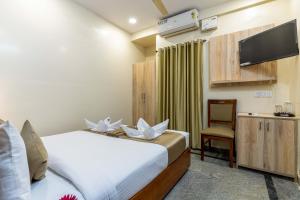 Hotel Chalet, Madiwala客房内的一张或多张床位
