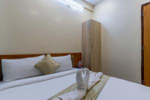 Hotel Chalet, Madiwala客房内的一张或多张床位