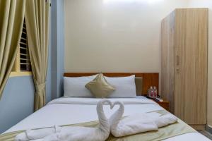 Hotel Chalet, Madiwala客房内的一张或多张床位