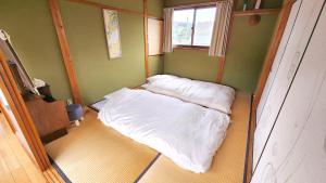 Postel nebo postele na pokoji v ubytování Guesthouse Trailhead