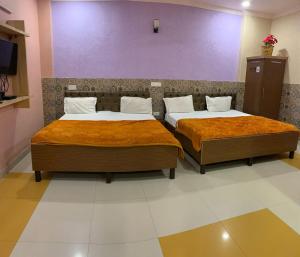 Hotel Galaxy客房内的一张或多张床位