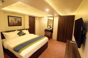 TV o dispositivi per l'intrattenimento presso Harsha Boutique Hotel
