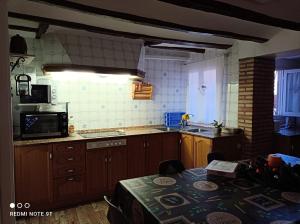 Kuchyň nebo kuchyňský kout v ubytování Casa Azafrán