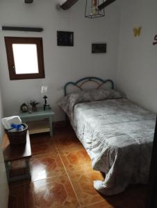 Postel nebo postele na pokoji v ubytování Casa Azafrán
