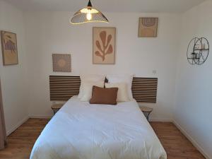 Katil atau katil-katil dalam bilik di Le D'lices, Spacieux, Centre-ville, Free parking